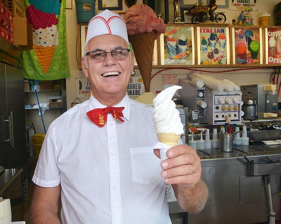 Happy man holding super duper ice cream.